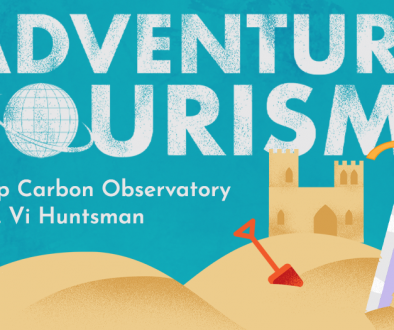 A blue banner showing golden sand dunes with a sandcastle in the background. A large sword is stabbed into the sand in the foreground. A grungey white title reads "Adventure Tourism". A clean white subtitle gives the title of the episode, "Deep Carbon Observatory feat. Vi Huntsman"